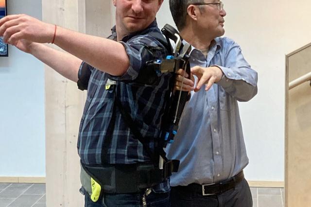 Rasmus trying the Exoskeleton