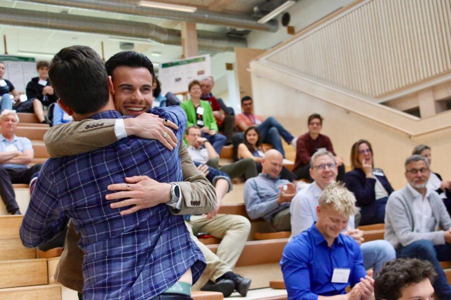 Martin hugs his Industry Supervisor Nikolaj Hansen